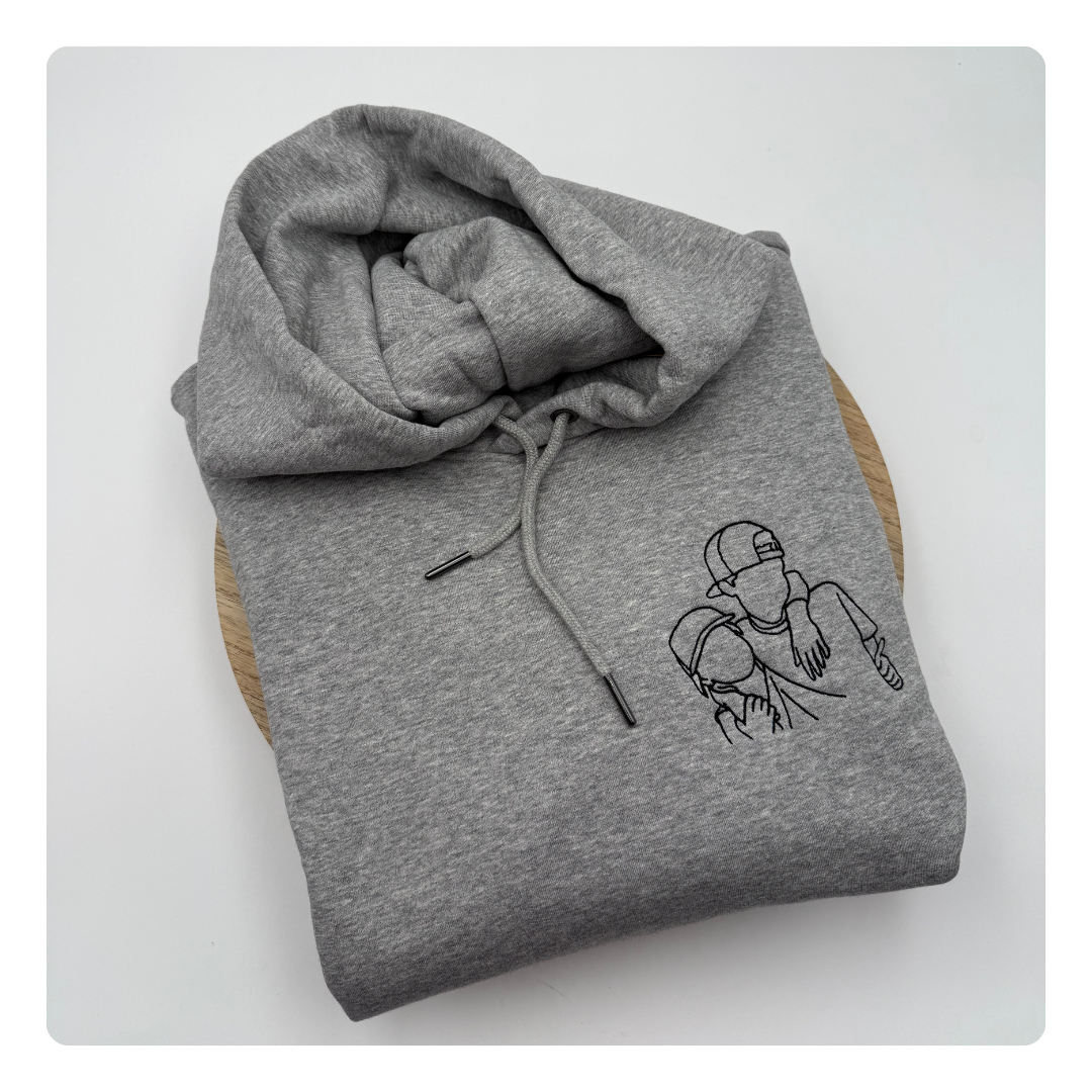 geborduurde trui met lijntekening van kinderen 