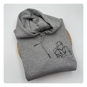 geborduurde trui met lijntekening van kinderen 