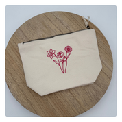Toilettas met geboortebloemen