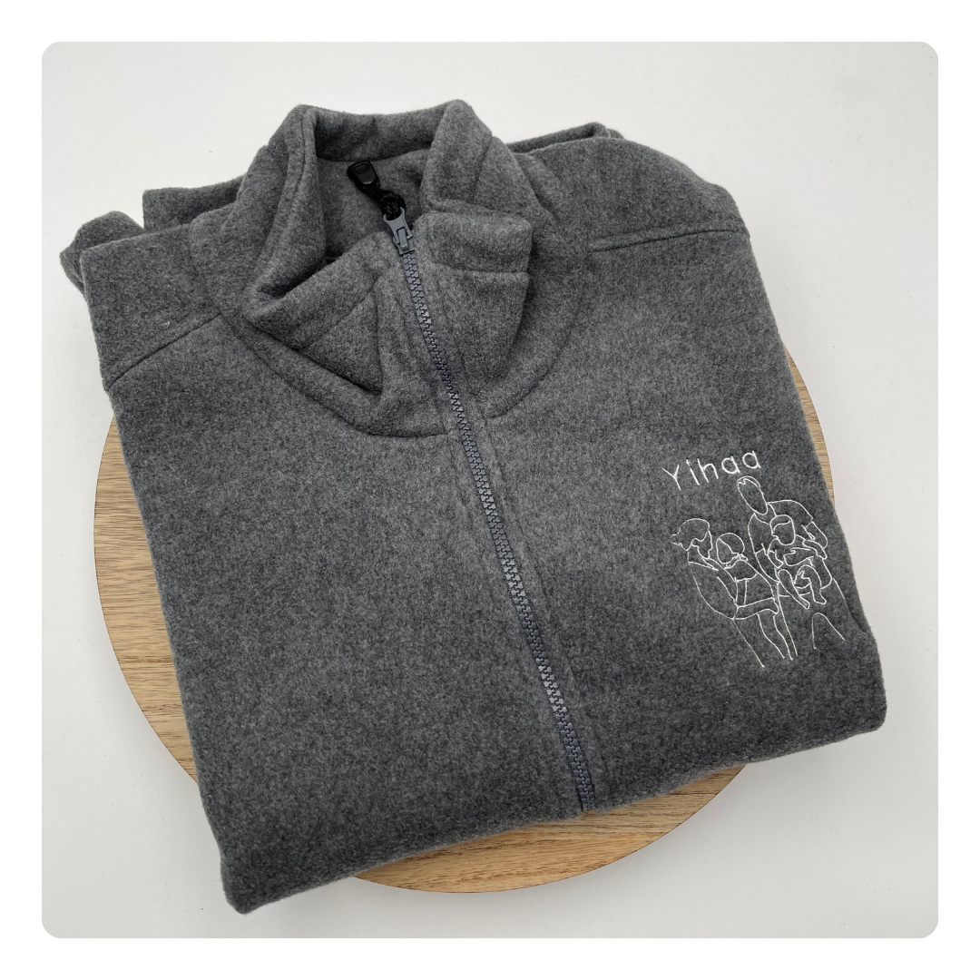 fleece trui met geborduurde tekst